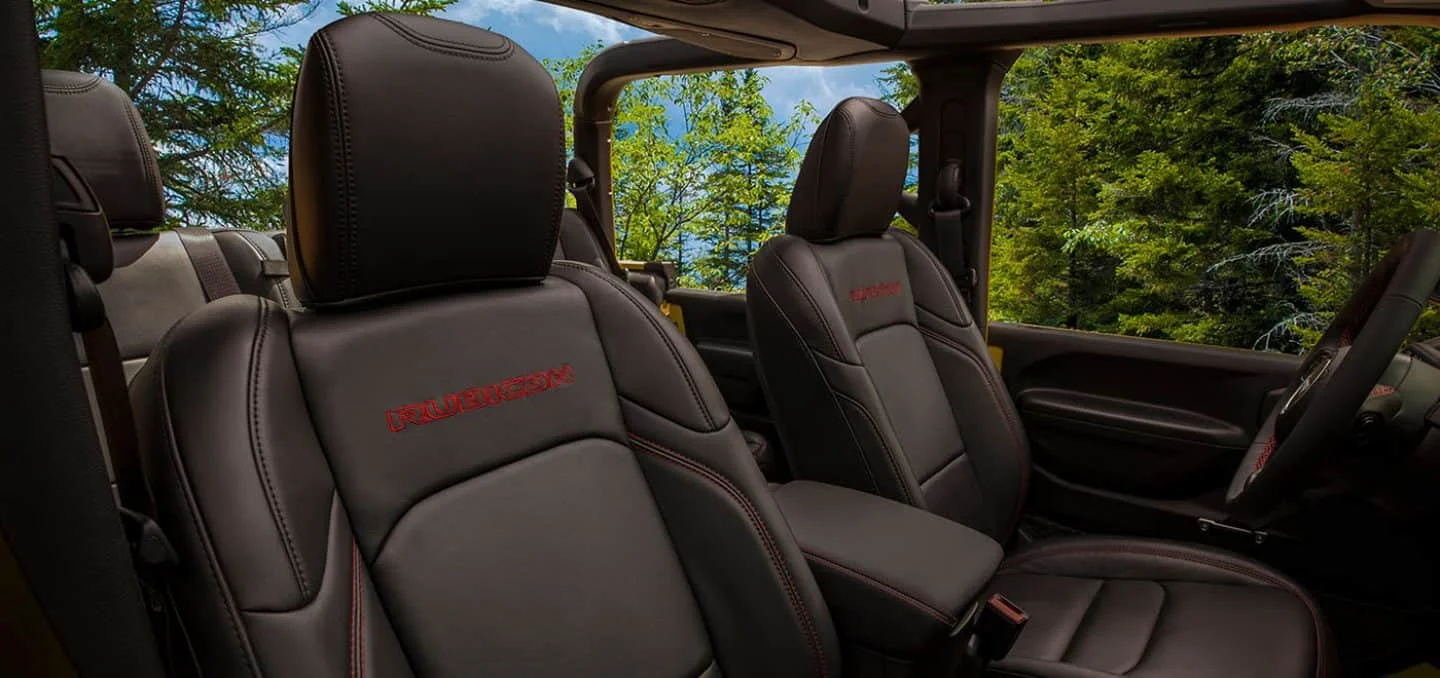 2026 Jeep Gladiator interior infotainment touchscreen and center stack with climate controls